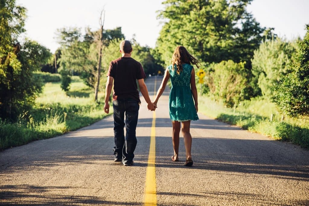 Couple holding hands